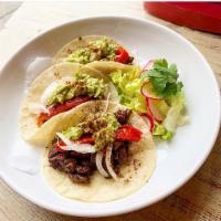 Tacos de Steak  · Skirt Steak, Onions, Rajás, Guacamole.
3 Tacos per order  
