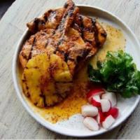 Pork Chops al Pastor · Grilled pineapple, side of rice and black beans.