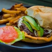Canave Burger · Angus beef, chipotle mayo, avocado and hand cut french fries.