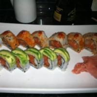 Spicy Dragon Roll · Served with spicy tuna wrapped with masago and avocado on the outside.