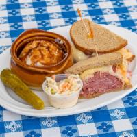 Corned Beef Reuben · Swiss, sauerkraut and Russian dressing on grilled rye