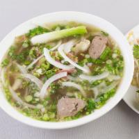 N1. Special Noodle Soup · Eye round steak, lean meat, beef flank, tendon and beef meatball. Served with beansprouts, b...