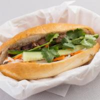 S3. BBQ Sandwich · Served with homemade pate, mayonnaise, carrot, cilantro, cucumber, jalapeno, soy sauce and b...