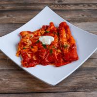 Famous Baked Cheese Enchiladas · 4 cheese enchiladas, red, green, or Spanish sauce. Served with sopapillas with honey.

Serve...