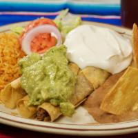 Flautas · Crispy corn tortillas filled with shredded beef, shredded chicken, or potato, served with re...