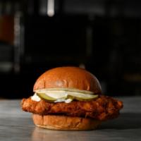 Nashville Hot Chicken Sandwich · SAVORY AND MILD SPICY. Buttermilk breaded Chicken dipped in Nashville Style Hot Oil, dressed...