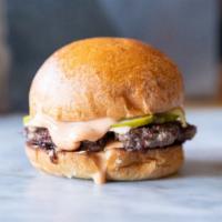 Burger · Fresh ground beef seared with caramelized onions, pickles and special sauce on toasted Brioc...
