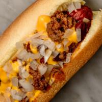 Chili Cheese Dog · MEATY CHEESY. Martin's Potato Hotdog Bun, Sabrett All-beef Hotdog, Homemade Beef Chili, nach...