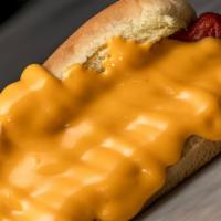 Cheese Dog · CLASSIC CHEESY. Martin's Potato Hotdog Bun, Sabrett All-beef Hotdog, nacho cheese sauce and ...