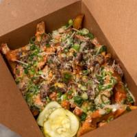 Loaded Fries - Chop Cheeseburger · NEW YORK CLASSIC. 12oz. basket of fries topped with chopped fresh beef, cheese, onions, pick...