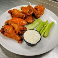 Chicken Wings · Buffalo, Old Bay, BBQ, served with celery and bleu cheese.