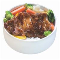 BBQ Chicken Bowl · Served with steamed vegetables and rice in bowl.