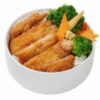 Chicken Katsu Bowl · Served with steamed vegetables and rice in bowl.