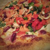South Philly Pizza  · Mozzarella, roasted red peppers, kalamata olives, mushrooms, garlic, spinach and chopped tom...