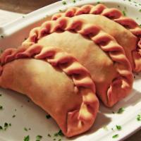 Empanadas (3) · Cuban turnovers filled with either chicken or ground beef.