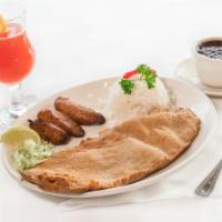 Breaded Steak · A breaded palomilla steak fried and topped with chopped onions. Served with white rice, blac...