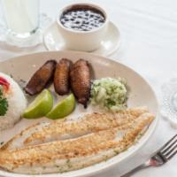 Fish Fillet · Fish fillet lightly breaded in flour either fried or grilled. Served with white rice, black ...