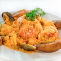 Seafood Paella · Seafood Paella. Includes a lobster tail. Served with sweet plantains.