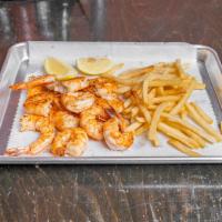 Grilled Shrimp · 12 pieces of large shrimp grilled in butter sauce served with french fries. 