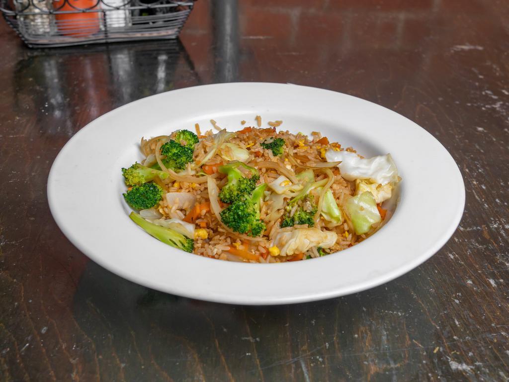 Vegetable Fried Rice · Fried Rice with egg, onions, green cabbage, carrots and broccoli. 