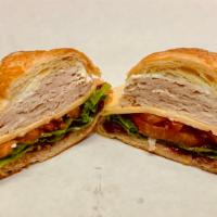 4. Turkey Cranberry Gouda Sandwich · All natural Thuman's roasted turkey, cranberry sauce, smoked Gouda, lettuce, tomato and mayo...