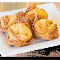 Crab Rangoon · Crab and cream cheese wontons served with house-made sweet & sour sauce.