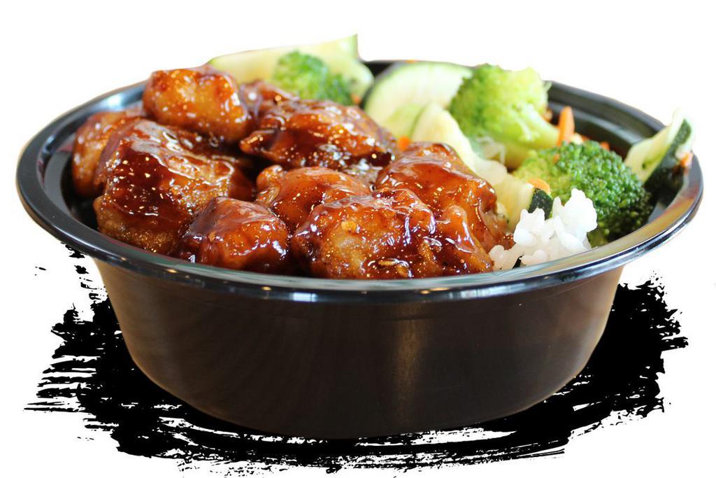 Mad Spicy Orange Chicken · Whoa – spicy and sweet in one bowl? That’s Mad! Try our new Mad Orange bowl with our delicious orange chicken first wok-tossed with our famous orange sauce and then tossed with our new MAD SAUCE! Piled over your choice of white rice, brown rice, fried rice or noodles and includes stir-fry veggies!
