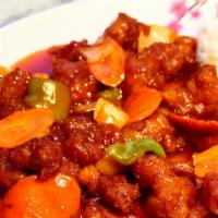 12. Sweet and Sour Chicken · Deep-fried chicken sautéed in sweet&sour sauce w/onions, green peppers &carrots.