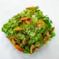 Fattoush Chicken Salad · Romaine lettuce, lemon, olive oil, sumac seasoning, tomato, cucumber and chicken.