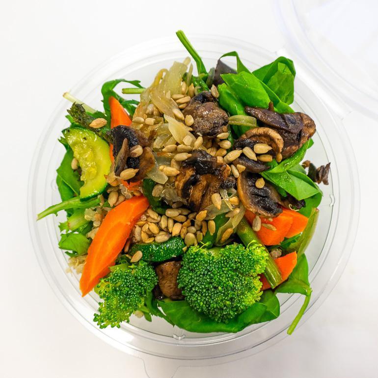 Vegan Power Bowl · Mixed greens, spinach, carrots, broccoli, onions, asparagus, quinoa or brown rice, with your choice of topping and dressing.