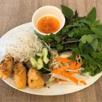 Chao Tom Cuon Banh Trang · Grilled shrimp patty wrapped over sugar cane served with rice sheet, vermicelli and vegetabl...
