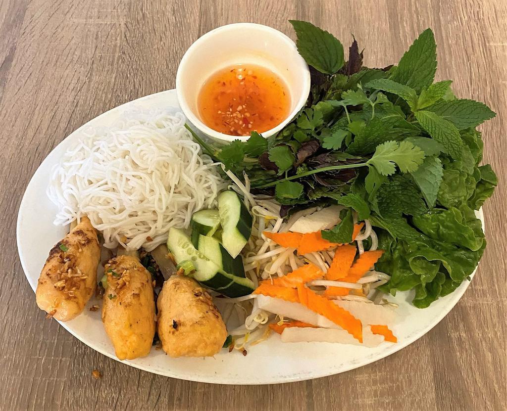 Chao Tom Cuon Banh Trang · Grilled shrimp patty wrapped over sugar cane served with rice sheet, vermicelli and vegetables.