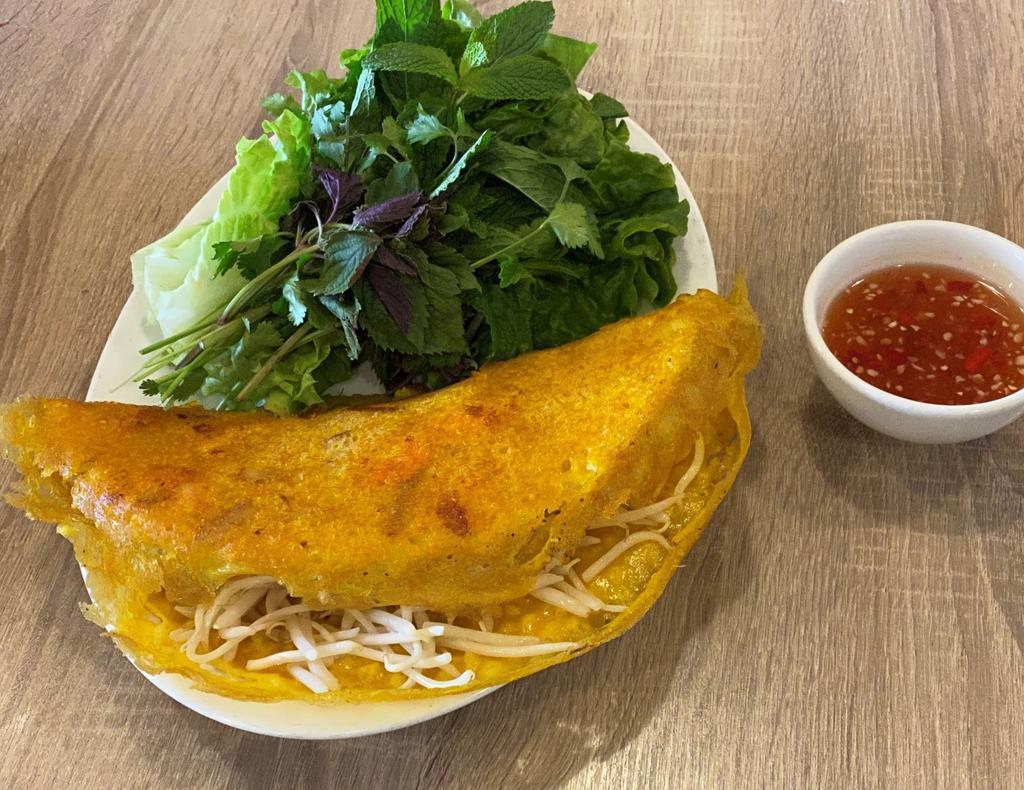Banh Xeo · Crispy rice  pancake filled with shrimp, pork and bean sprout.