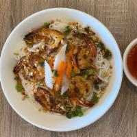 Bun Tom Nuong · Grilled shrimp over vermicelli and vegetables.