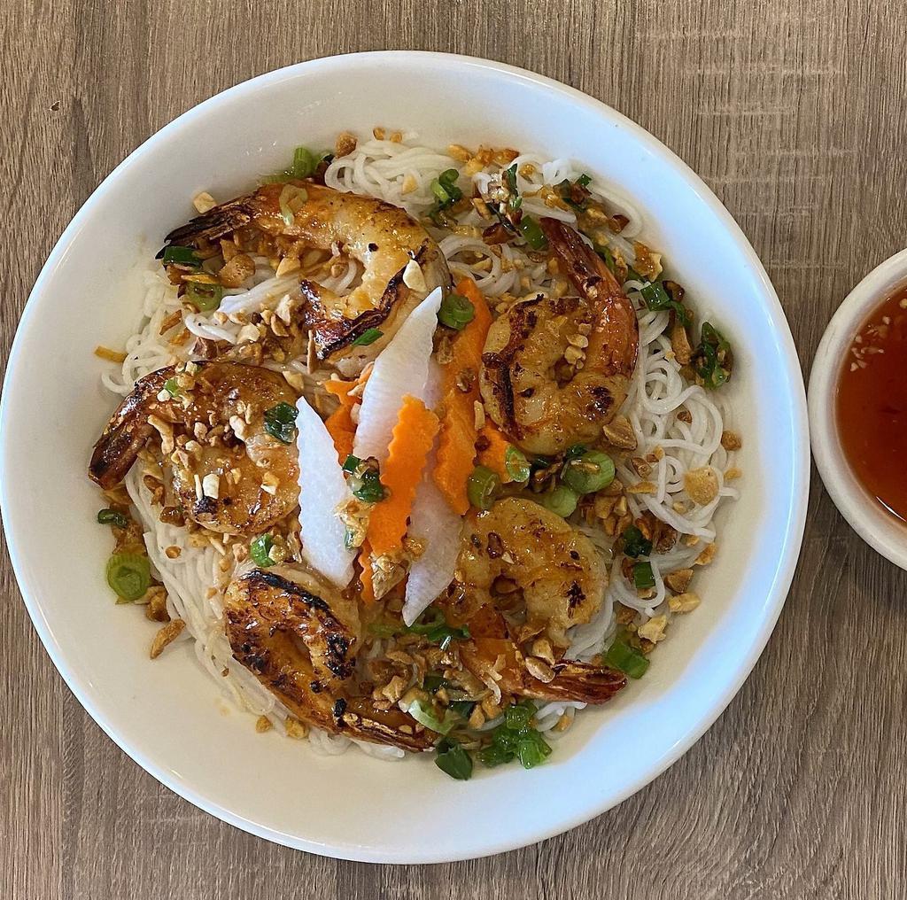Bun Tom Nuong · Grilled shrimp over vermicelli and vegetables.