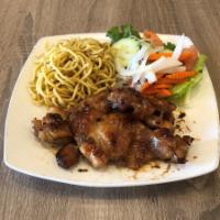 Ga Ro Ti Mi Toi · Grilled boneless chicken thighs served with garlic noodle and vegetables.