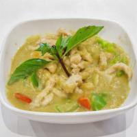 Green Curry · Basil leaves, potatoes, onions and bell peppers slowly cooked in spicy green curry. Served w...