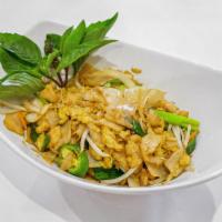 Drunken Noodles · Stir fried flat rice noodles with vegetables in spicy basil sauce. Hot and spicy. 