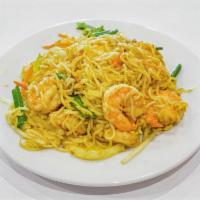 Singapore Rice Noodles · Rice noodles with eggs and vegetables in curry sauce. 