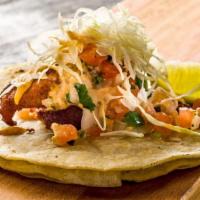 Pescado Taco · Baja style fried tilapia, chipotle mayo, cabbage, pico del gallo and lime.