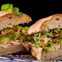 Aguacate con Queso Torta · Avocado and queso oaxaca, lettuce, tomato and chipotle mayo. Traditional Mexican street sand...