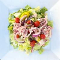 Antipasto Salad · Romaine lettuce with salami, provolone cheese, olives, and artichoke. Includes Italian vinai...