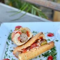 Italian Sausage, Peppers and Onions · Spicy Chicken Sausage, sauteéd onions, and our homemade marinara sauce; toasted on a baguette.