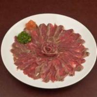 BF SASHIMI · 4oz Center Cut Certified Angus Beef filet mignon, seared and thinly sliced. Served with our ...