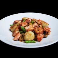 SEAFOOD TEPPAN · lightly seasoned and grilled salmon, scallops, and shrimp; served with al-dente teppan-grill...