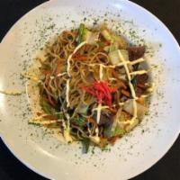 TOFU YAKISOBA · Stir fried noodles with vegetables in Yakisoba Sauce drizzled with Japanese mayo and grated ...