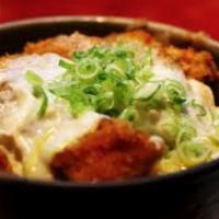 KATSU DON · Panko-breaded pork tenderloin, egg, onion and shiitake mushrooms served over rice. Drizzled ...