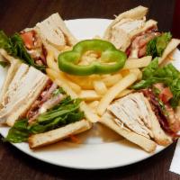 Chipotle Turkey Club Triple Decker Sandwich · Comes with cheddar cheese, bacon, tomato, lettuce, red onion and chipotle mayo on a toasted ...