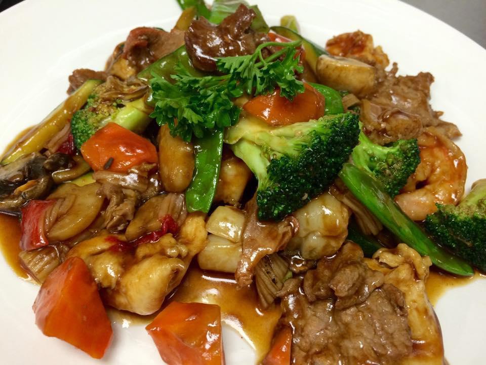 Happy Family · Chicken, beef, roasted pork, shrimp, scallops and crab meat stir-fried with veggies.