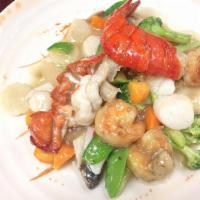 Seafood Delight · Lobster, shrimp, scallops and crabmeat stir-fried with assorted Veggies in our house special...